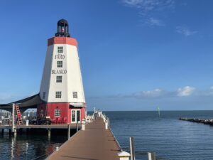 BRADventures docked at Faro Blanco Lighthouse in Marathon, Florida, under clear blue skies.